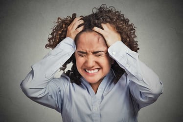 Woman looking shocked at all the corporate buzzwords