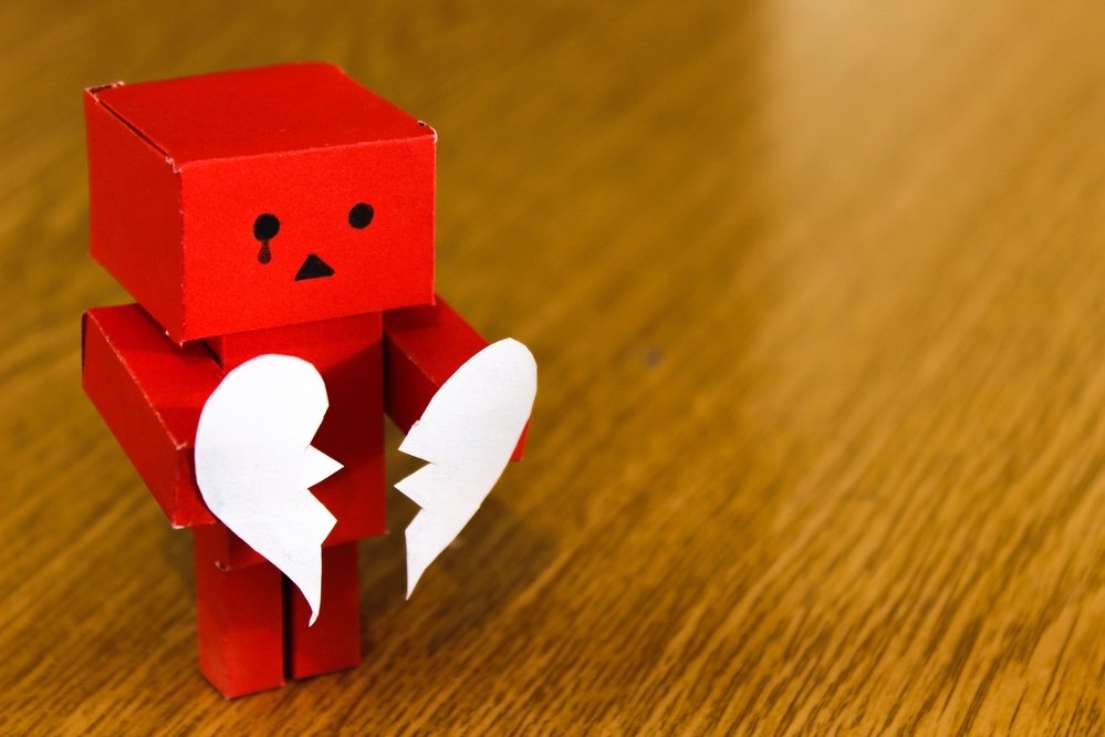 sad paper robot - quality stock images