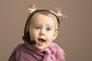 Child wearing headset: communication as new client account manager